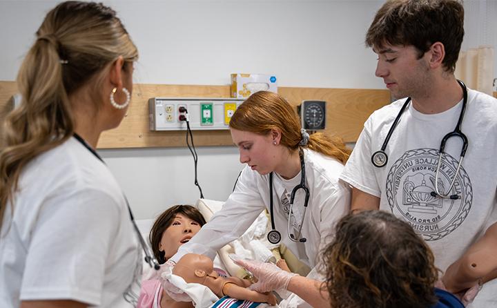 BW Nursing Students with Childbirth Simulator